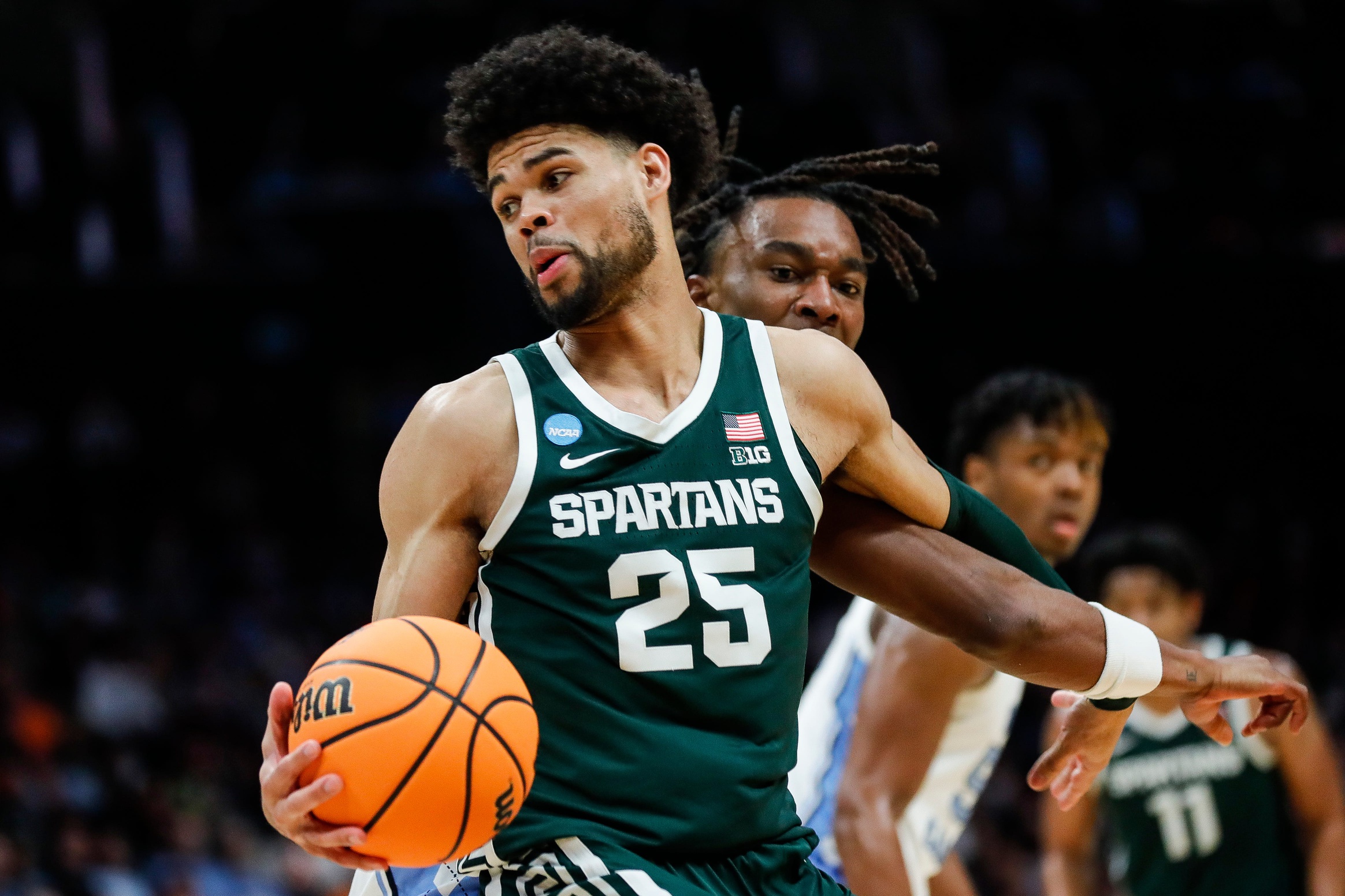 Malik Hall pulls off a spin move in the second round of the NCAA Tournament against UNC.