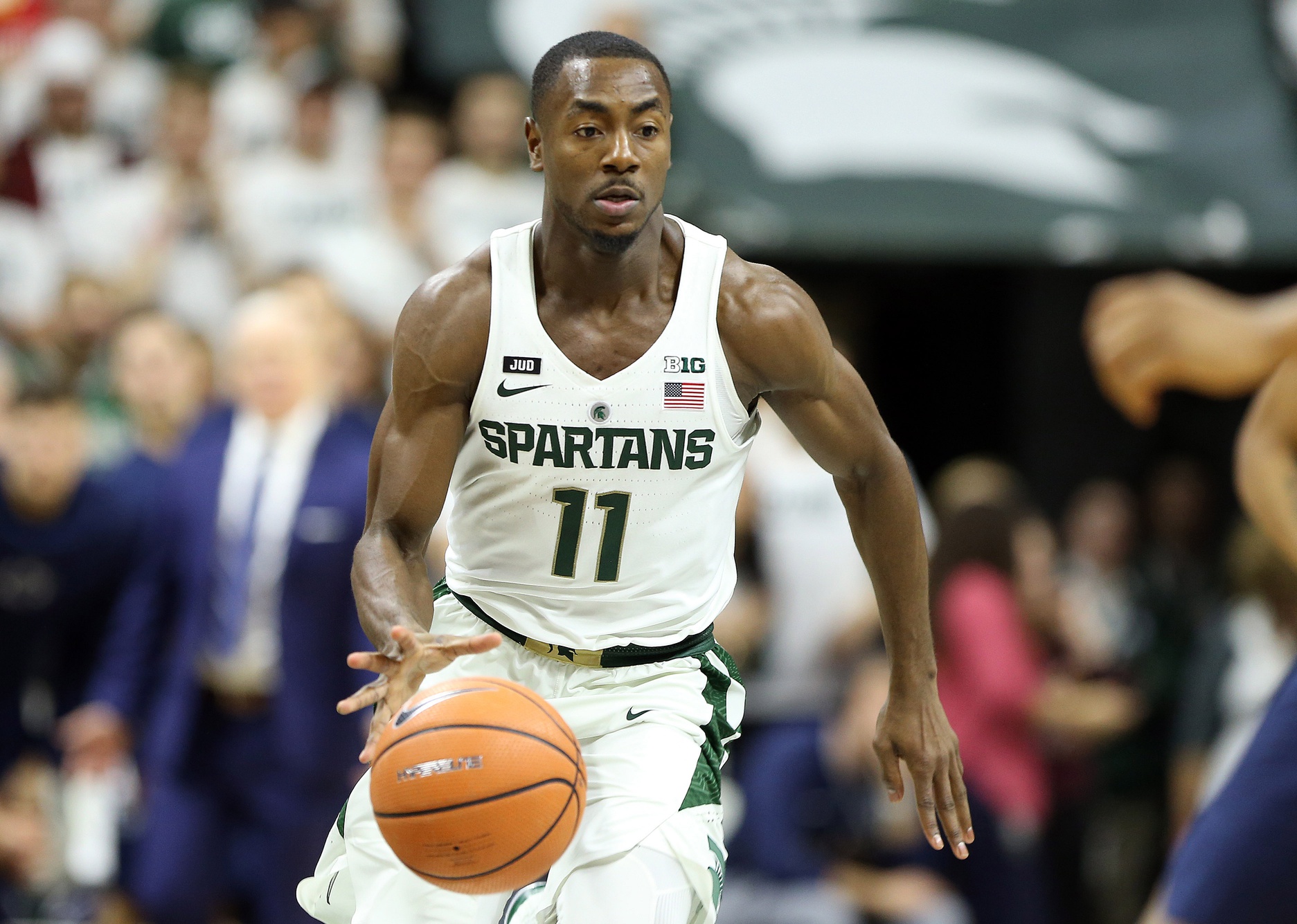 Former Michigan State point guard Tum Tum Nairn dribbles up the floor.
