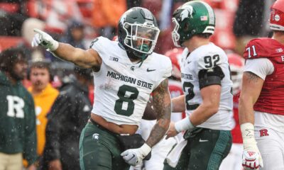 Former Michigan State football running back Jalen Berger celebrates a first down at Rutgers.