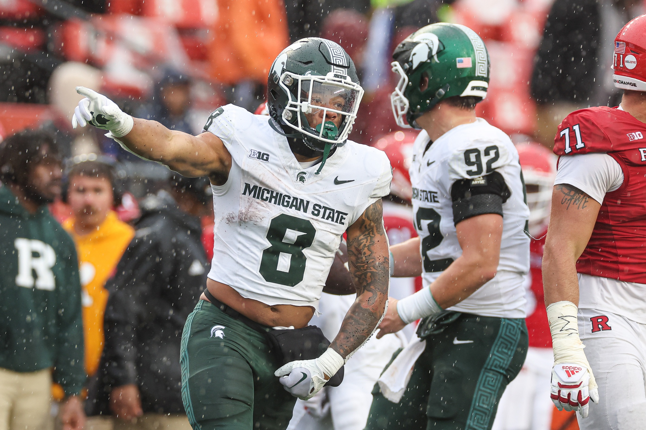 Former Michigan State football running back Jalen Berger celebrates a first down at Rutgers.