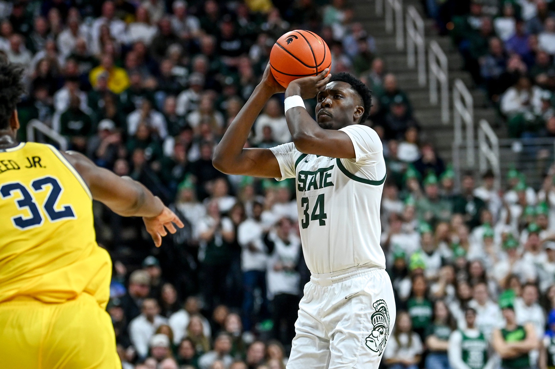 Xavier Booker takes a shot against rival Michigan at home.