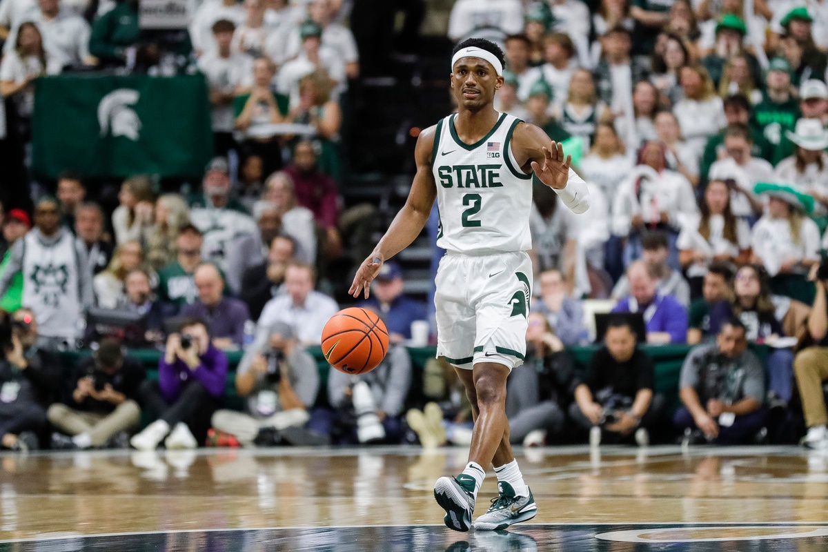 Tyson Walker walks the ball up the floor.