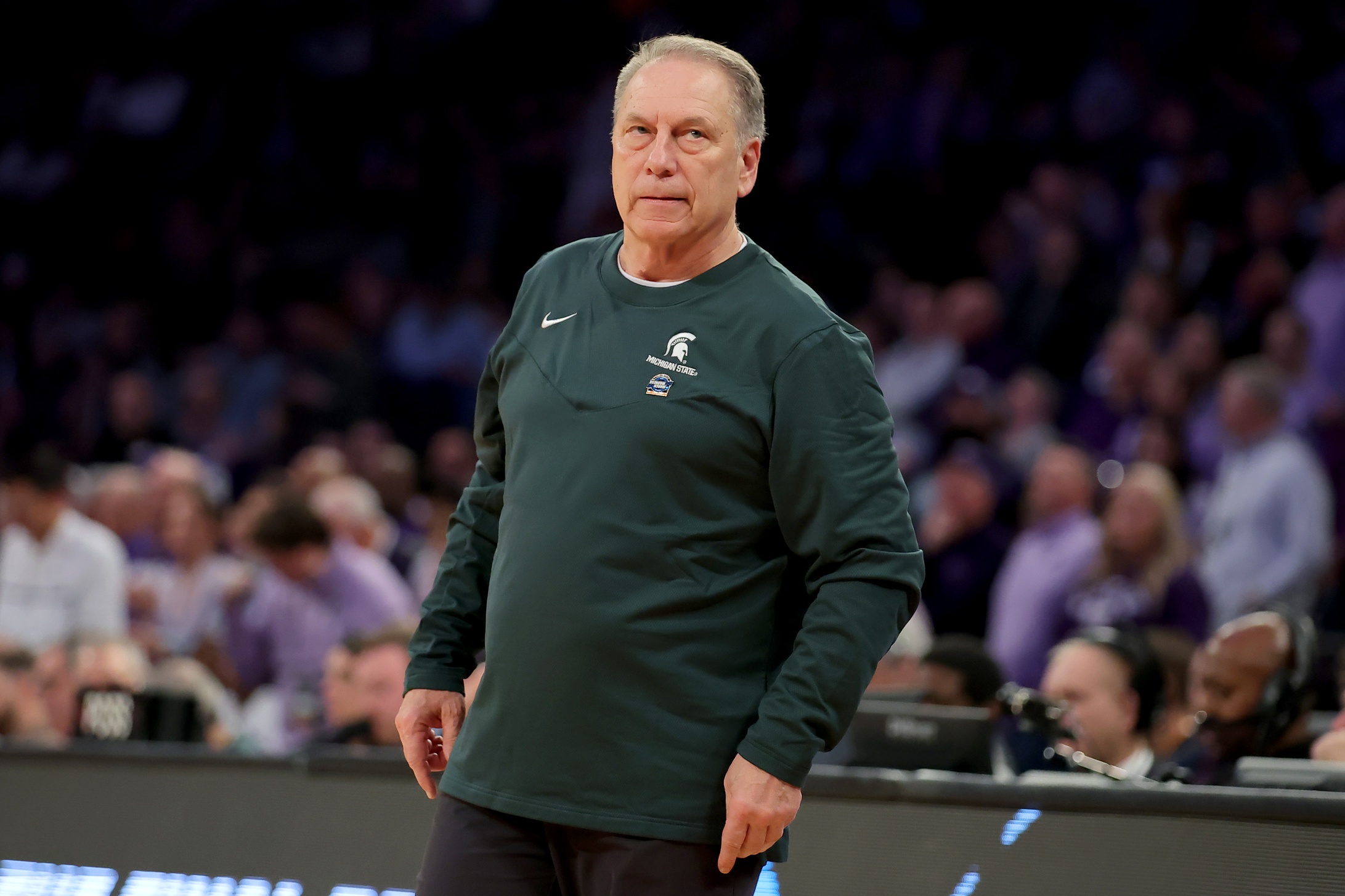 Michigan State basketball coach Tom Izzo roams the sidelines.