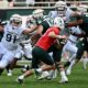 Michigan State football defensive tackle Alex VanSumeren extends for a sack attempt in the spring game.