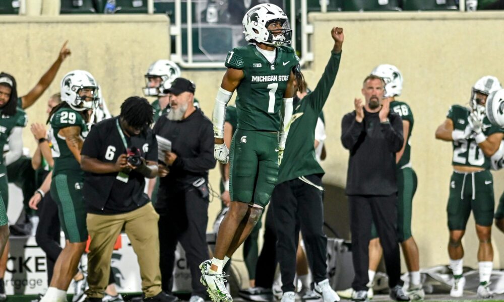 Former Michigan State football safety Jaden Mangham celebrates a defensive stop.