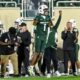 Former Michigan State football safety Jaden Mangham celebrates a defensive stop.