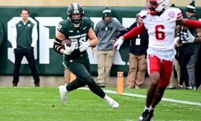 Michigan State football tight end Brennan Parachek runs with the ball against Nebraska.