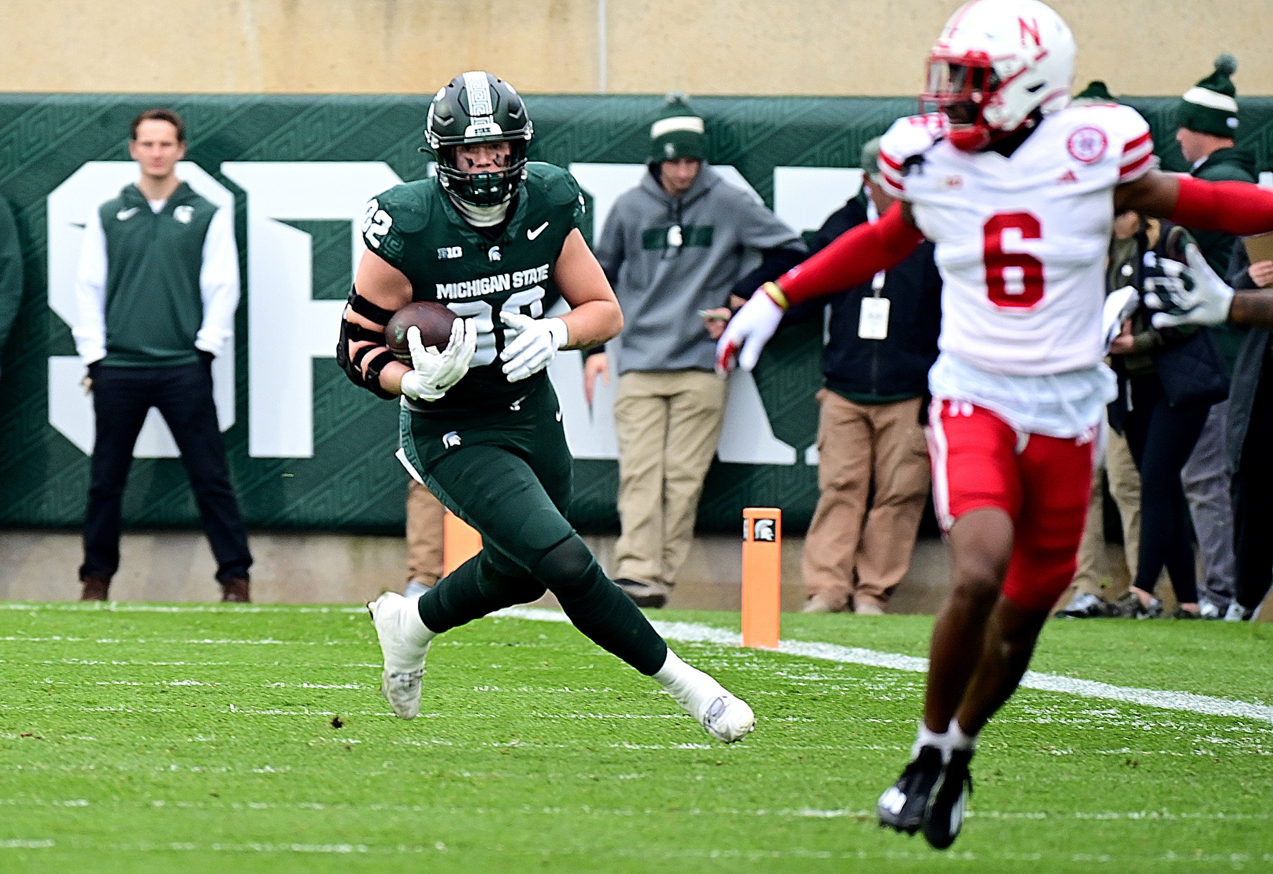 Michigan State football tight end Brennan Parachek runs with the ball against Nebraska.