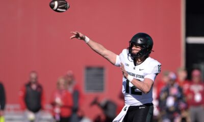 Former Michigan State football QB Katin Houser throws the ball against Indiana.