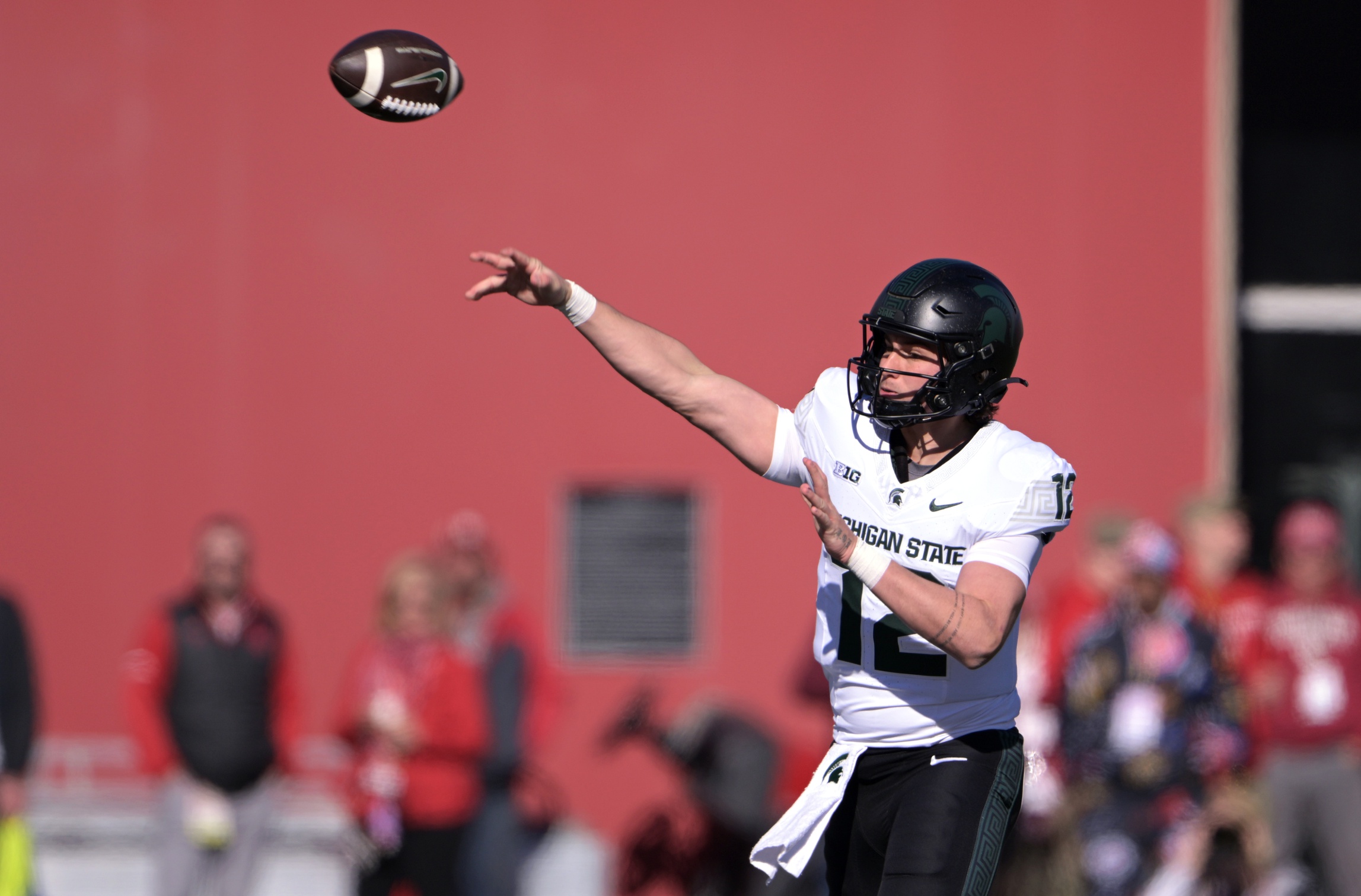 Former Michigan State football QB Katin Houser throws the ball against Indiana.