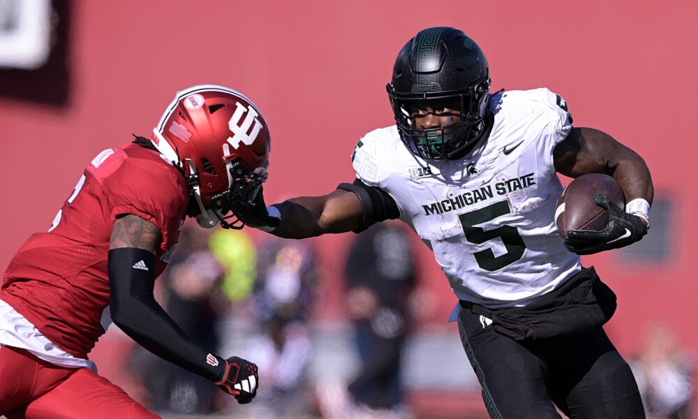 Michigan State football running back Nate Carter rushes vs. Indiana