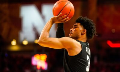 Michigan State basketball guard Jaden Akins takes a shot.