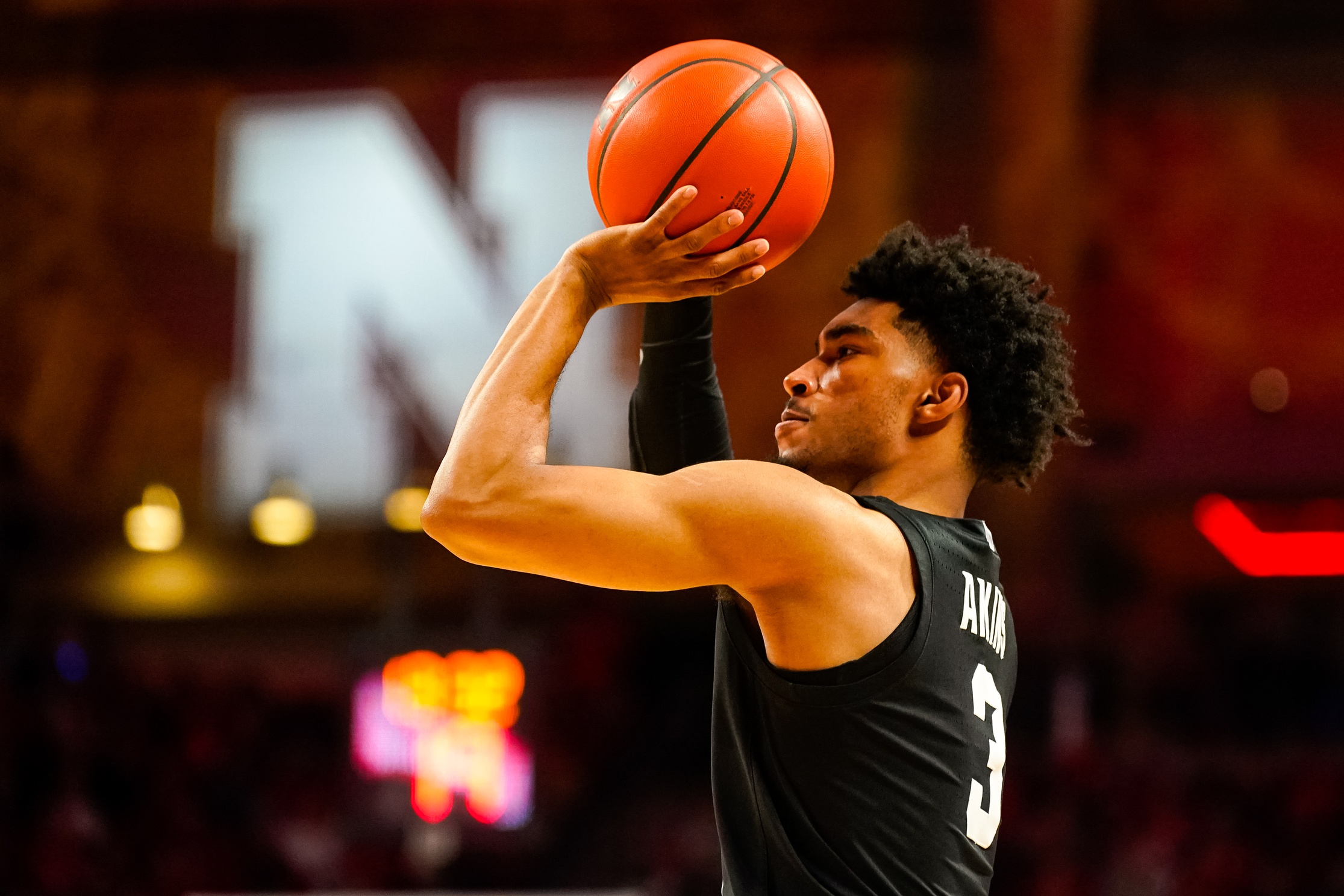 Michigan State basketball guard Jaden Akins takes a shot.