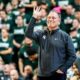 Michigan State basketball coach Tom Izzo on the sidelines reacts to a call.