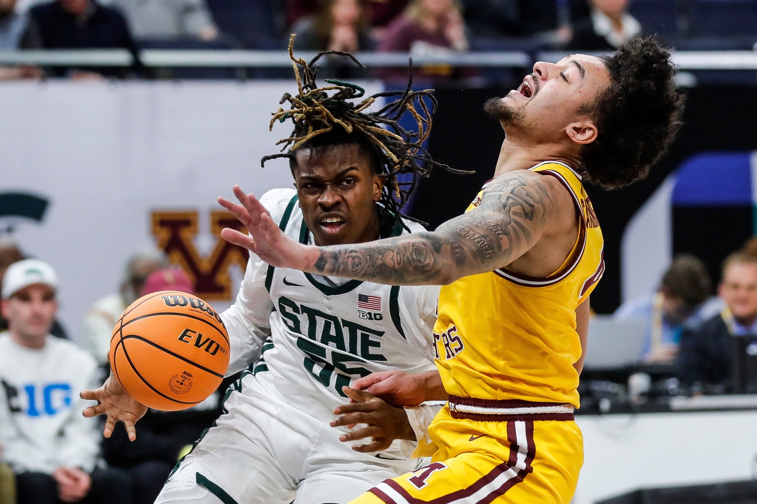 Michigan State basketball star Coen Carr drives to the hoop.