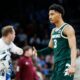 Michigan State basketball star Jaden Akins celebrates a basket.