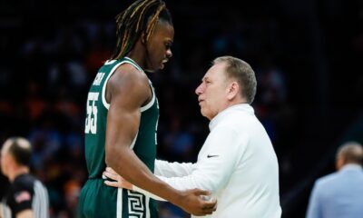 Michigan State basketball star Coen Carr speaks with Tom Izzo.