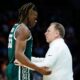 Michigan State basketball star Coen Carr speaks with Tom Izzo.