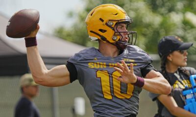 Former Michigan State football quarterback Sam Leavitt warms up in fall camp.