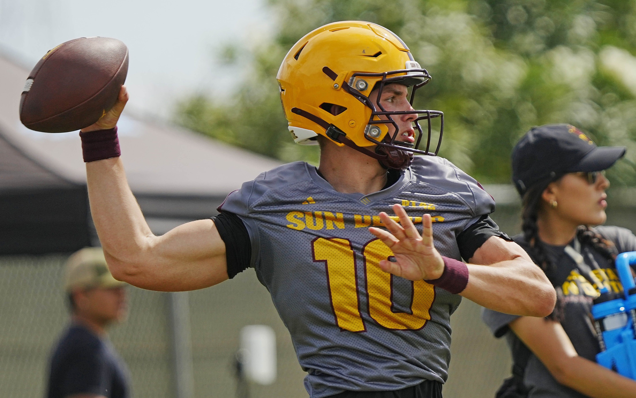 Former Michigan State football quarterback Sam Leavitt warms up in fall camp.