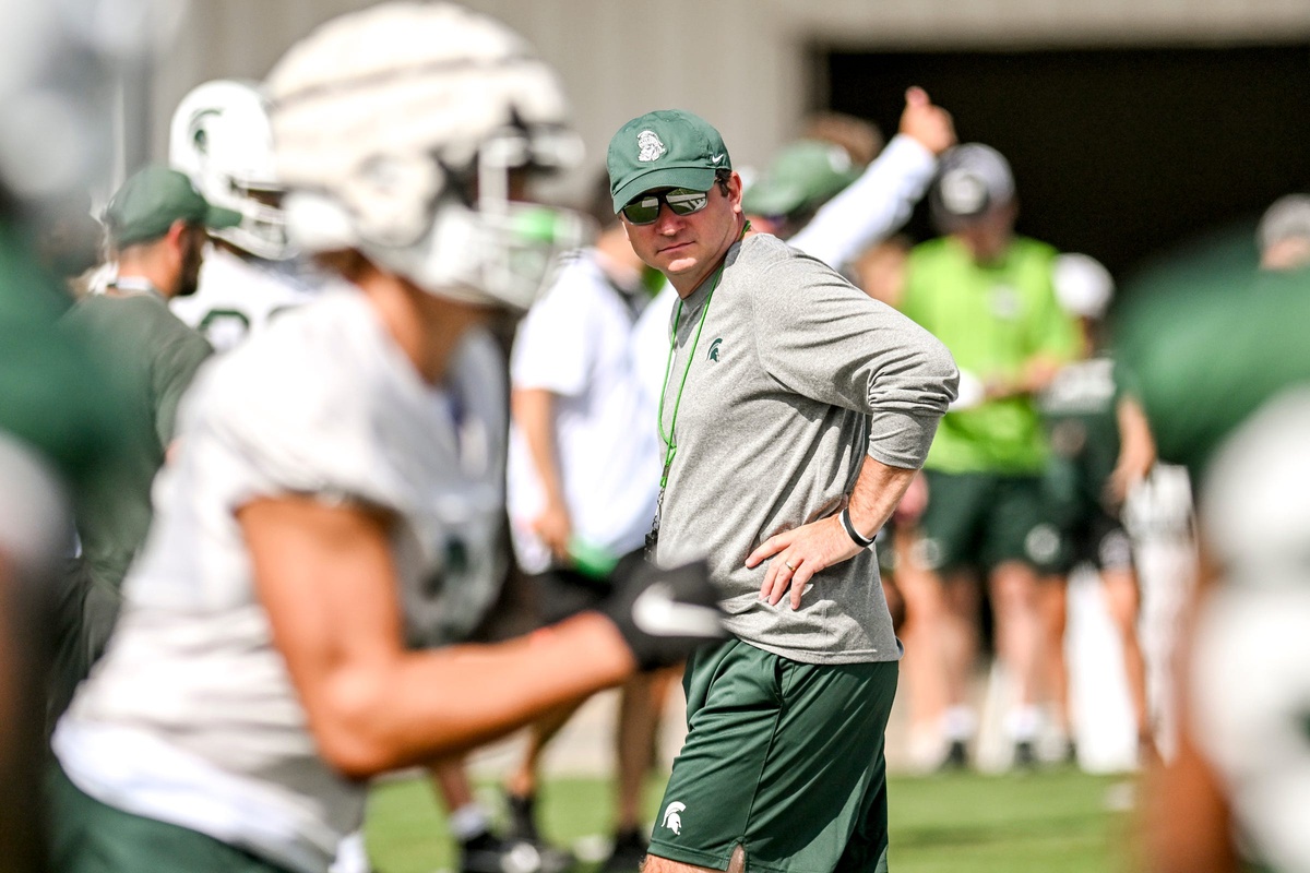 Michigan State football coach Jonathan Smith looks on during practice.