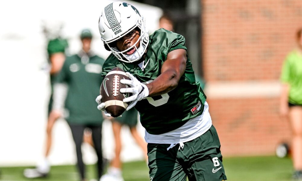 Michigan State football receiver Nick Marsh catches a pass in fall camp.