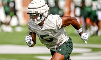 Jordan Hall runs through a drill at Michigan State football fall practice.