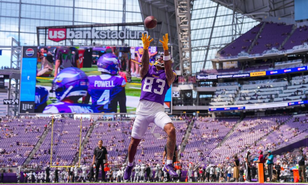 Former Michigan State football receiver Jalen Nailor catches a pass in Vikings warmups.