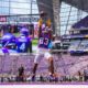 Former Michigan State football receiver Jalen Nailor catches a pass in Vikings warmups.