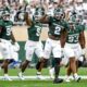 Michigan State football defense celebrates a sack against FAU.