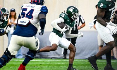 Michigan State football defensive back Angelo Grose returns an interception vs. FAU.