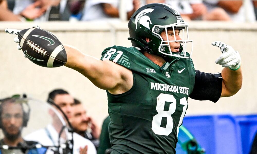 Michigan State football tight end Michael Masunas celebrates a catch.