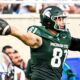 Michigan State football tight end Michael Masunas celebrates a catch.