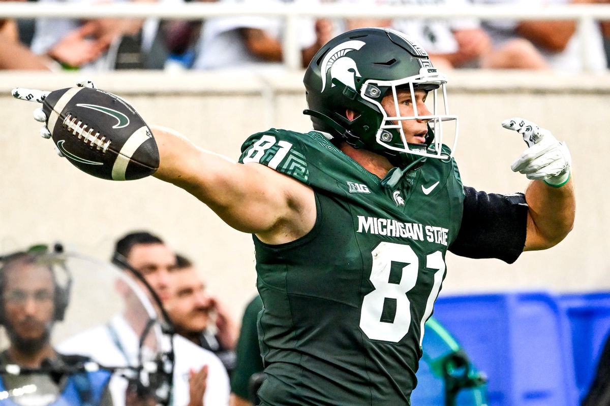 Michigan State football tight end Michael Masunas celebrates a catch.