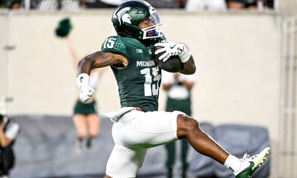 Michigan State football RB Kay'Ron Lynch-Adams runs for a touchdown.