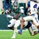 Michigan State football running back Nate Carter runs vs. FAU