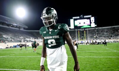 Michigan State football QB1 Aidan Chiles walks off the field after the FAU win.