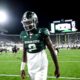 Michigan State football QB1 Aidan Chiles walks off the field after the FAU win.