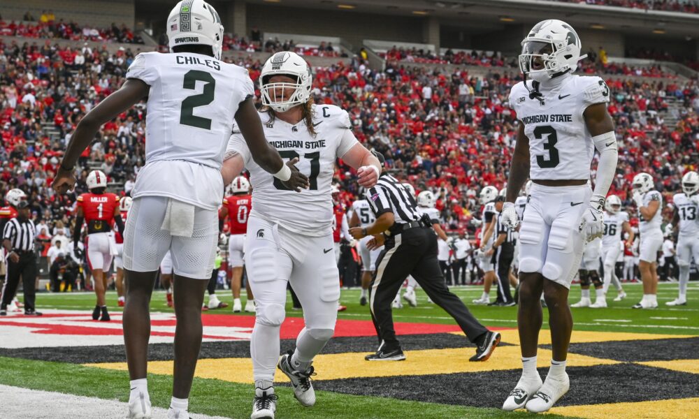 Michigan State football celebrates a touchdown at Maryland.