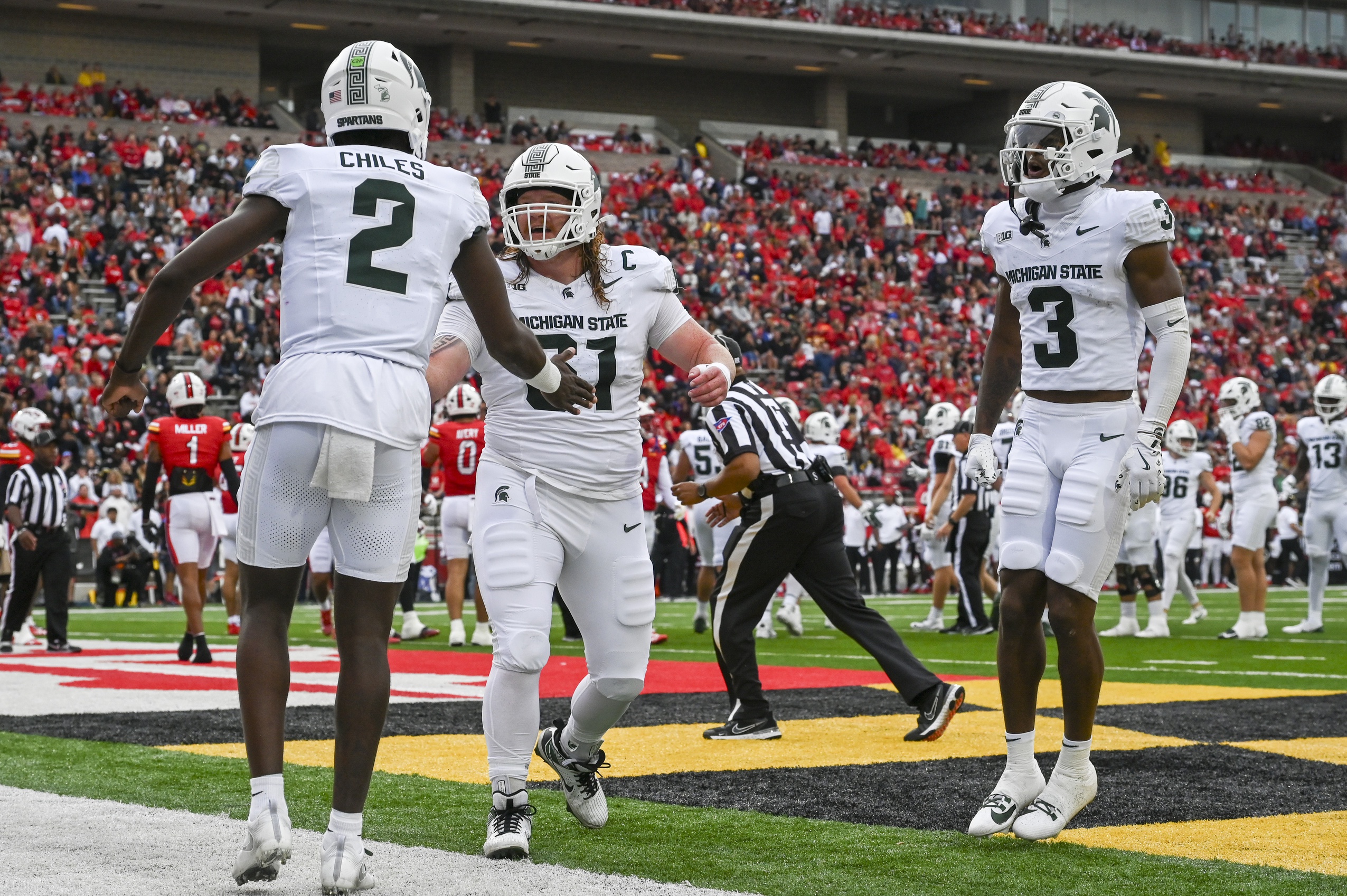 Michigan State football celebrates a touchdown at Maryland.