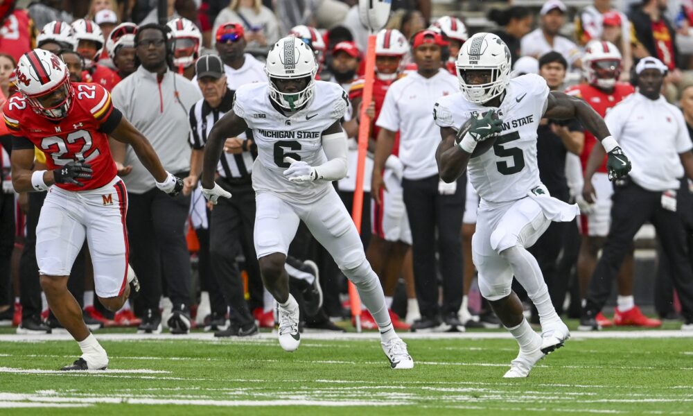 Michigan State football running back Nate Carter carries the ball vs. Maryland.