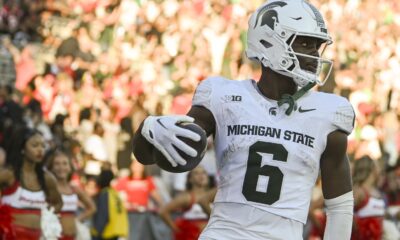 Michigan State football receiver Nick Marsh catches a touchdown pass.