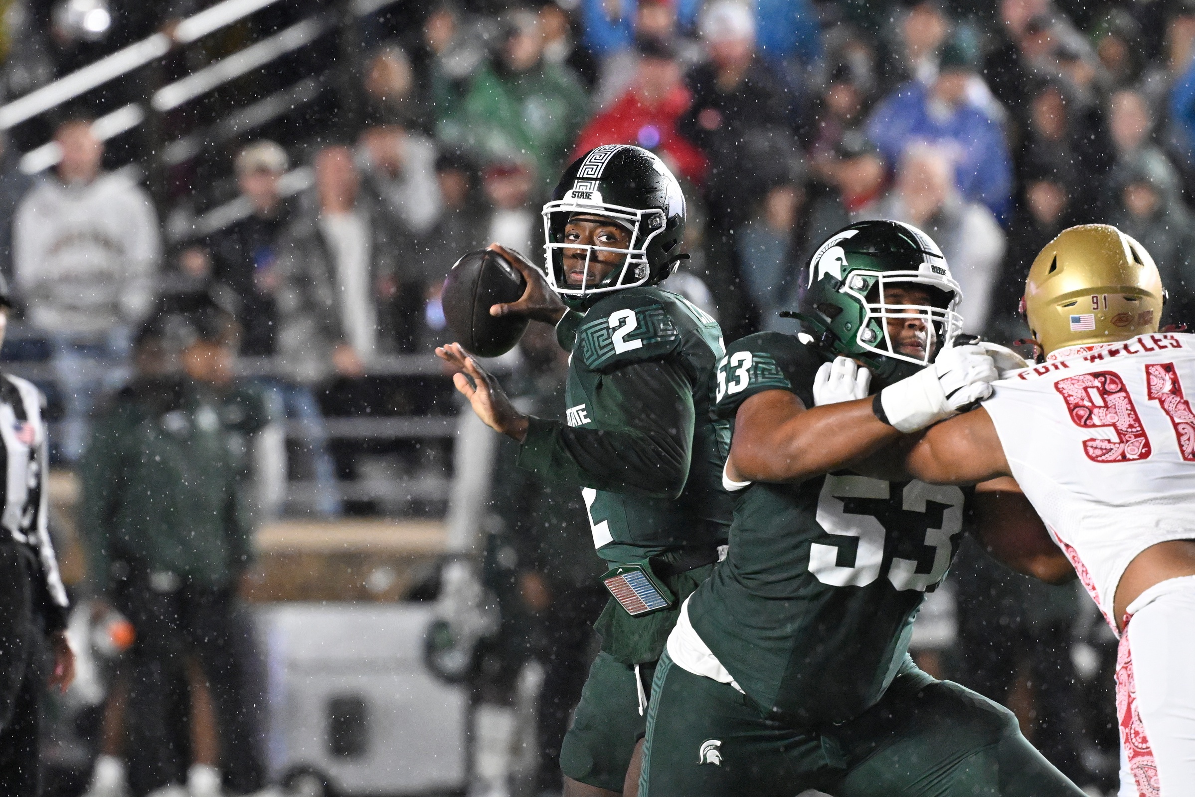 Michigan State football quarterback Aidan Chiles passes vs. Boston College