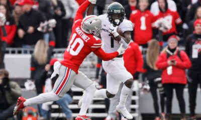 Michigan State football receiver Jayden Reed runs with the ball against Ohio State in 2021