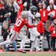 Michigan State football receiver Jayden Reed runs with the ball against Ohio State in 2021