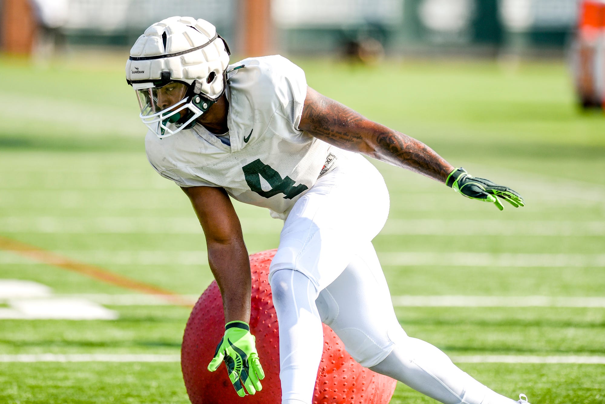 Michigan State football linebacker Jacoby Windmon goes through practice.