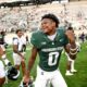 Michigan State football cornerback Charles Brantley celebrates a win.