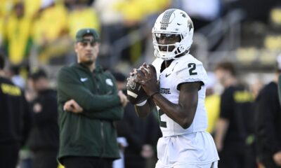 Michigan State football QB1 Aidan Chiles warms up before the Oregon game.