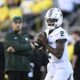 Michigan State football QB1 Aidan Chiles warms up before the Oregon game.