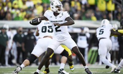 Michigan State football QB1 Aidan Chiles throws the ball.